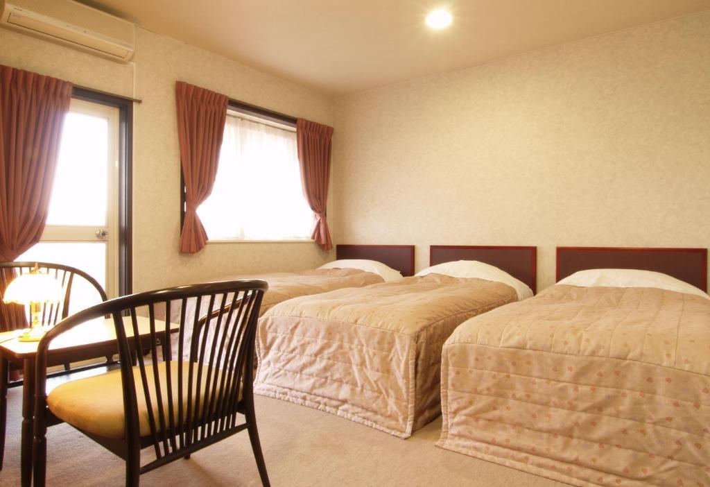 Akakura Yours Inn Myoko Pokoj fotografie
