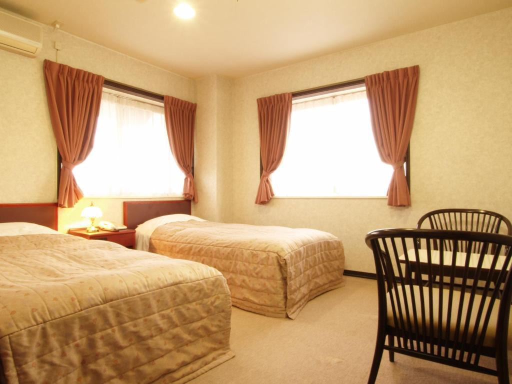 Akakura Yours Inn Myoko Pokoj fotografie